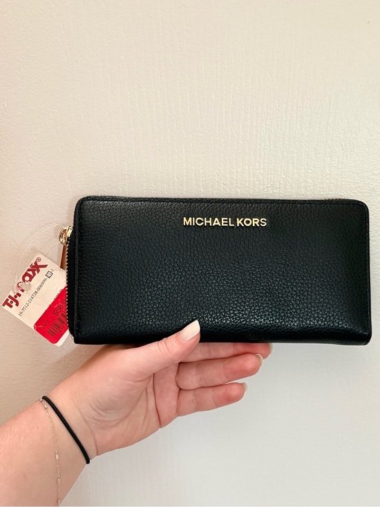 Michael Kors Handbags - Michael Kors Black Pebbled Leather Zip Wallet with Gold Logo